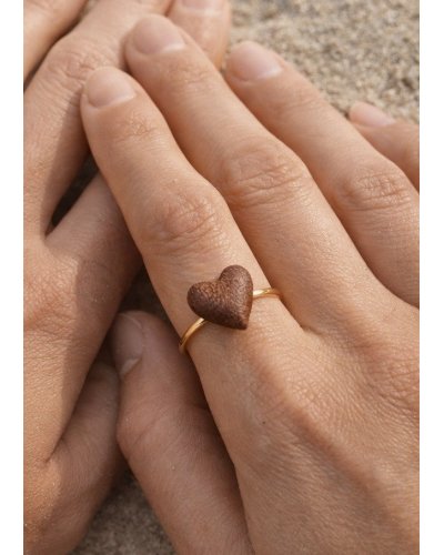 A charming ring with a mini heart. A unique gift for her