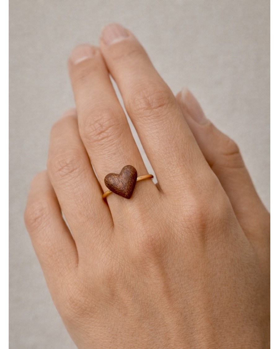 A charming ring with a mini heart. A unique gift for her
