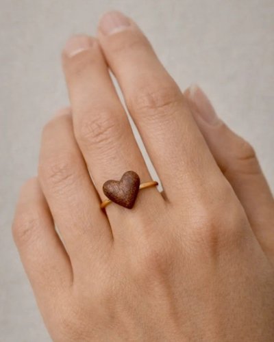 A charming ring with a mini heart. A unique gift for her