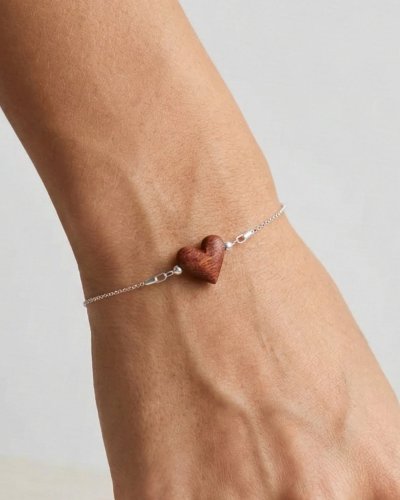 wooden heart bracelet on wrist